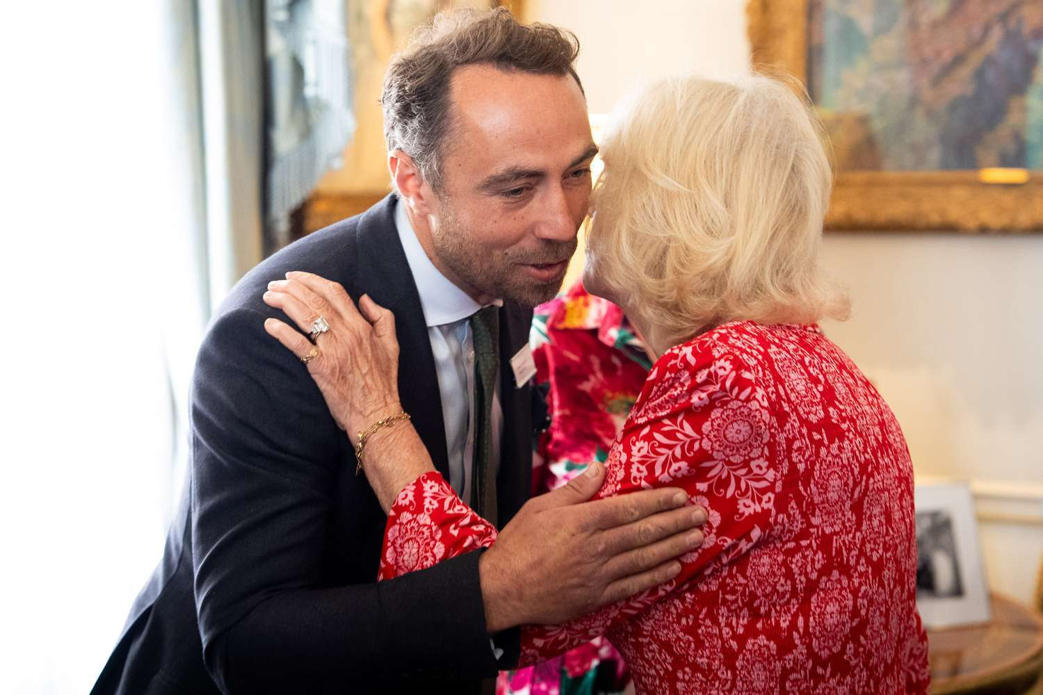 Queen Camilla Shares Tender Moment with James Middleton at Dog Charity Demo